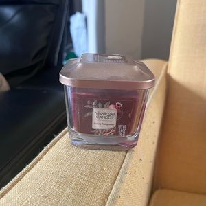 Yankee Candle.  Holiday Pomegranate. 3.4 oz jar candle.